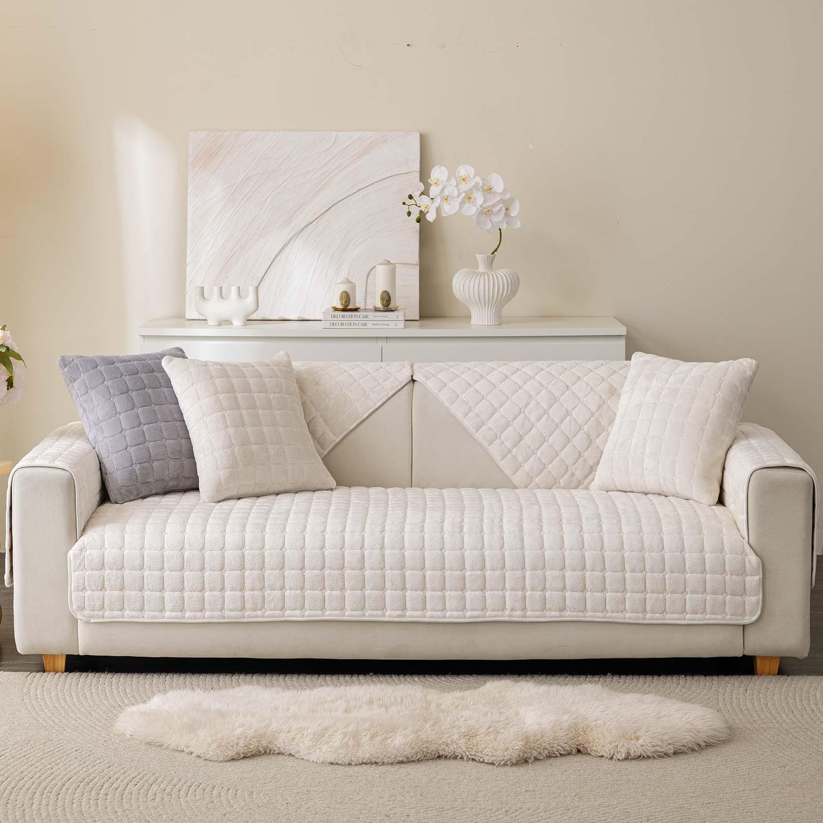 Aucrovee Velvet Washable Couch Cover packaging image for convenient storage and display.