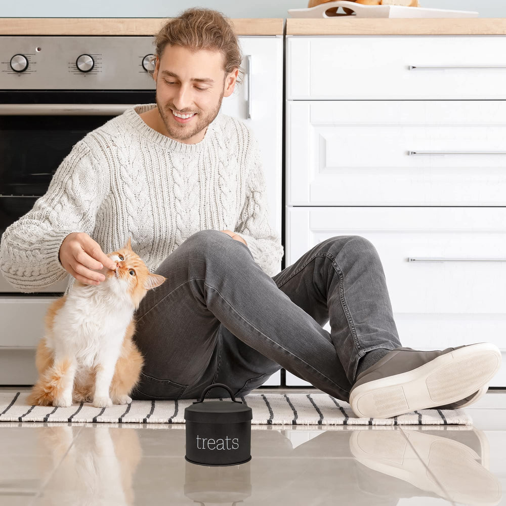 AuldHome Design enamel cat treat container black interior view with treats demonstrates convenient storage.