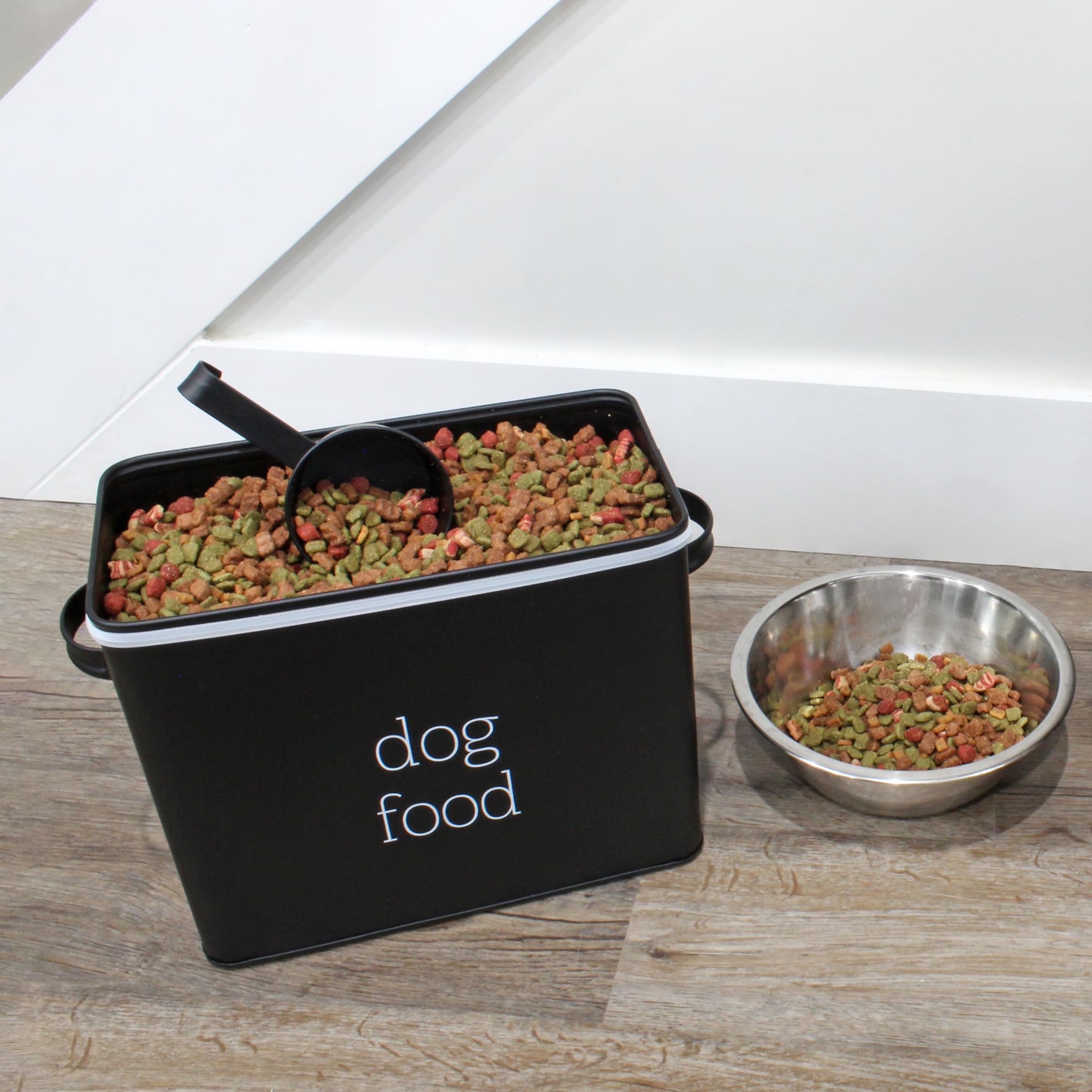 AuldHome Design black canister beside fresh pet treats on counter