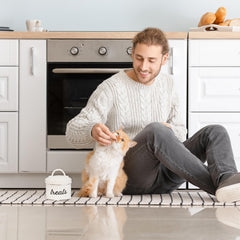 AuldHome Enamelware-cat-treat-container-airtight-seal highlights airtight freshness for treats.
