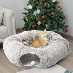 AUOON Cat Tunnel Bed under a Christmas tree shows festive display and cozy pet space