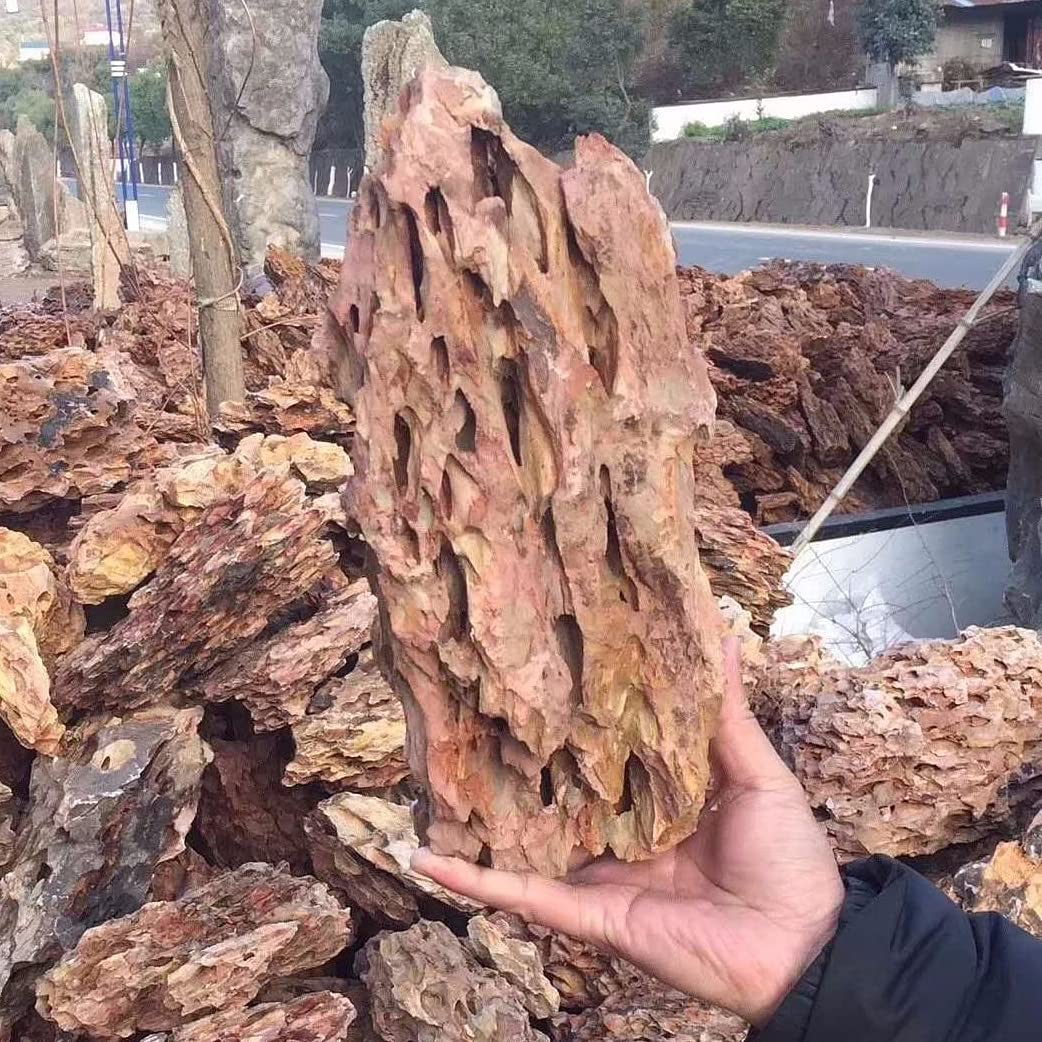AWXZOM Dragon Rock supports plant and moss growth in aquariums.