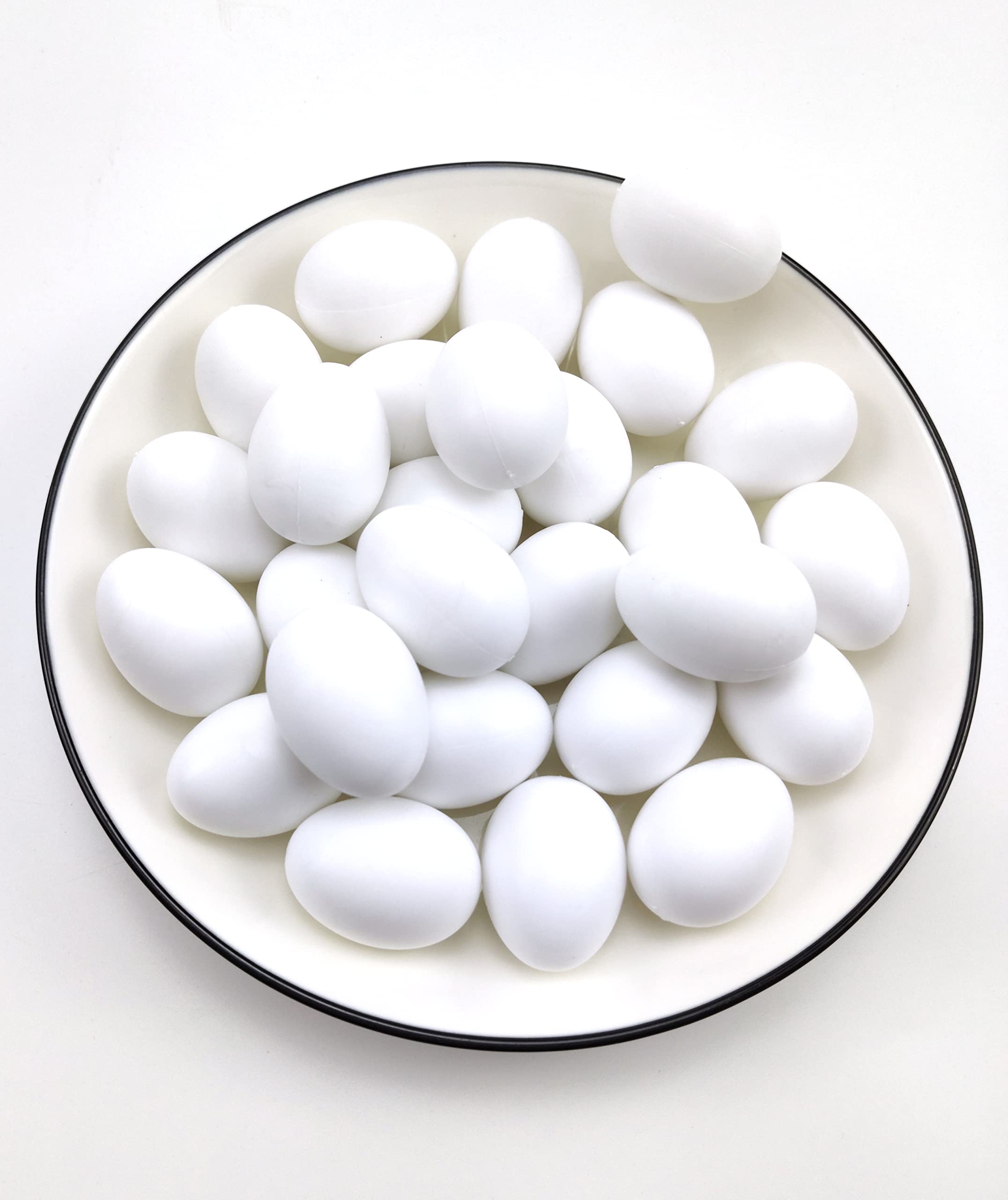 Azatemgo pigeon eggs in smooth white plastic for durable nesting aids.