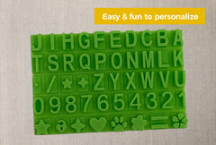 Baby Mushroom stencil kit enables colorful personalization with name and dates.