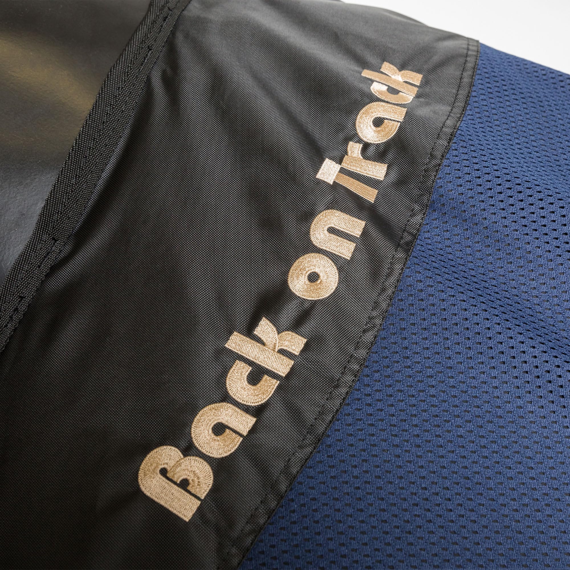 Back on Track Royal Mesh Sheet navy breathable mesh detail for cooling.