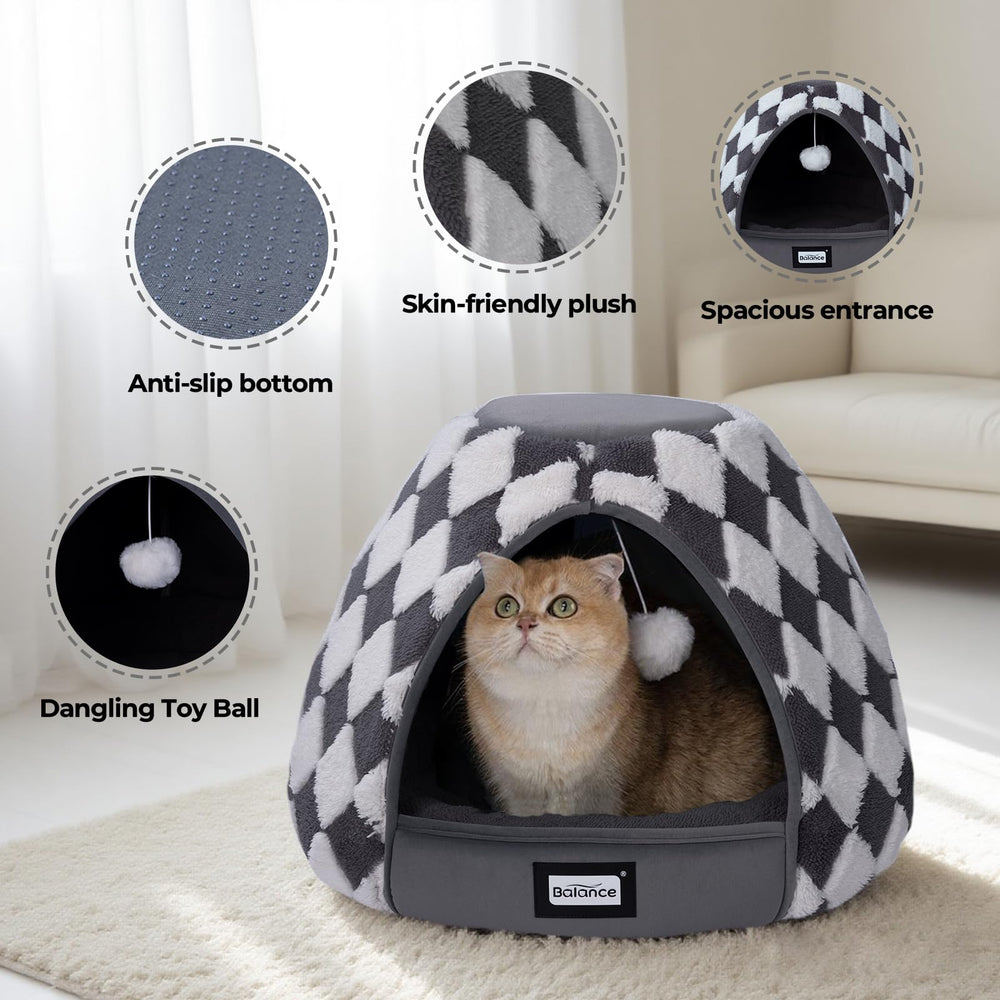 BALANCE Cat Bed cave entrance with hanging toy ball for interactive play.