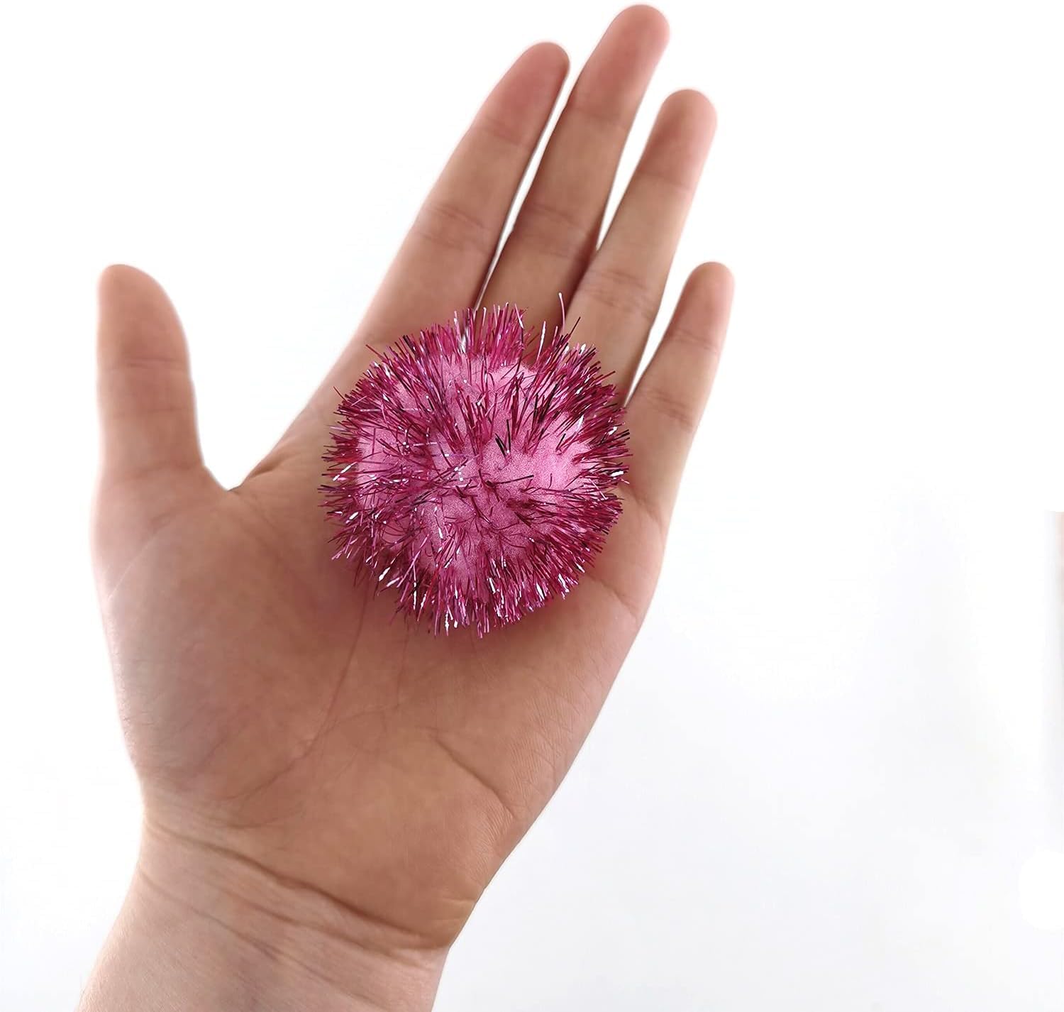 BallHull cat toy pom ball in motion invites batting and chasing sessions