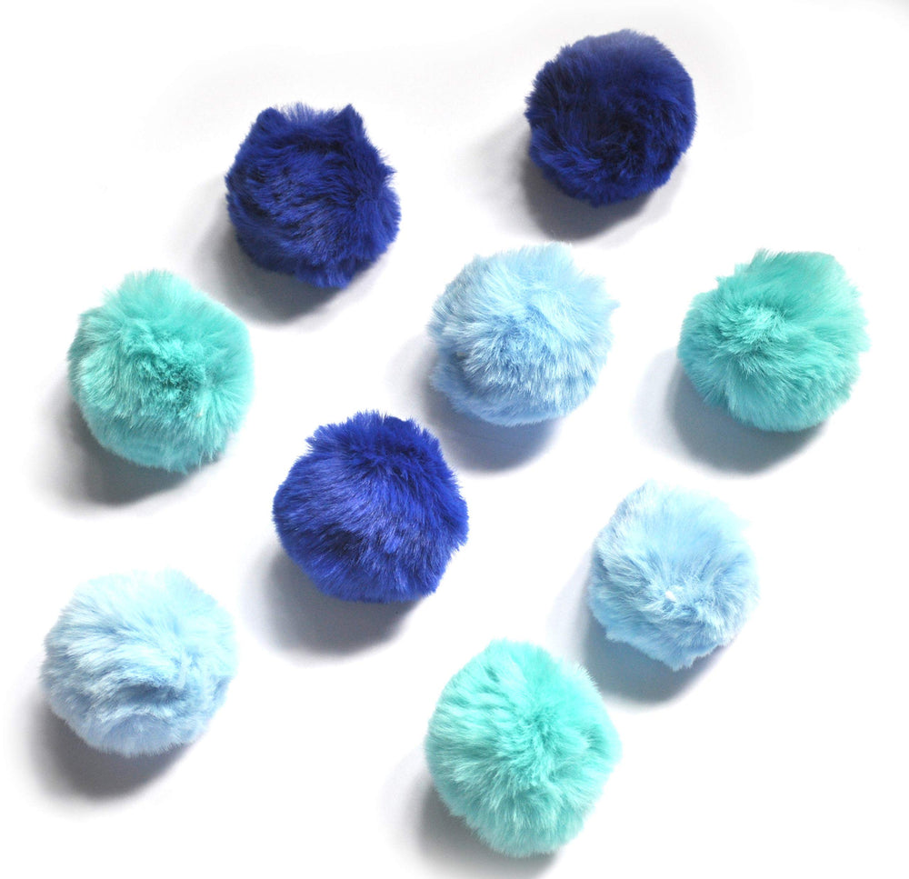 BALLMIE cat toy ball blue with bell closeup shows soft faux fur and rattle