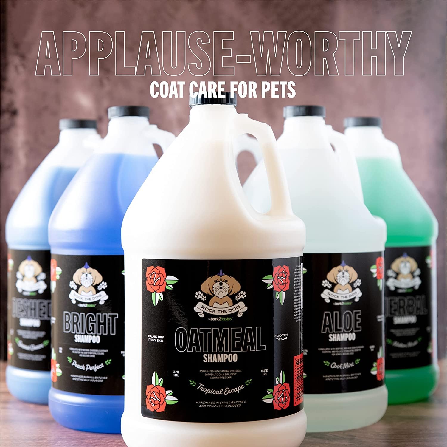 Bark2Basics Rock The Dog bottle in grooming setup signals professional-use suitability.