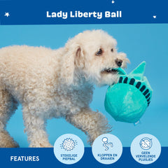BarkBox Lady Liberty Ball in action during playtime, ideal for fetch and tug.