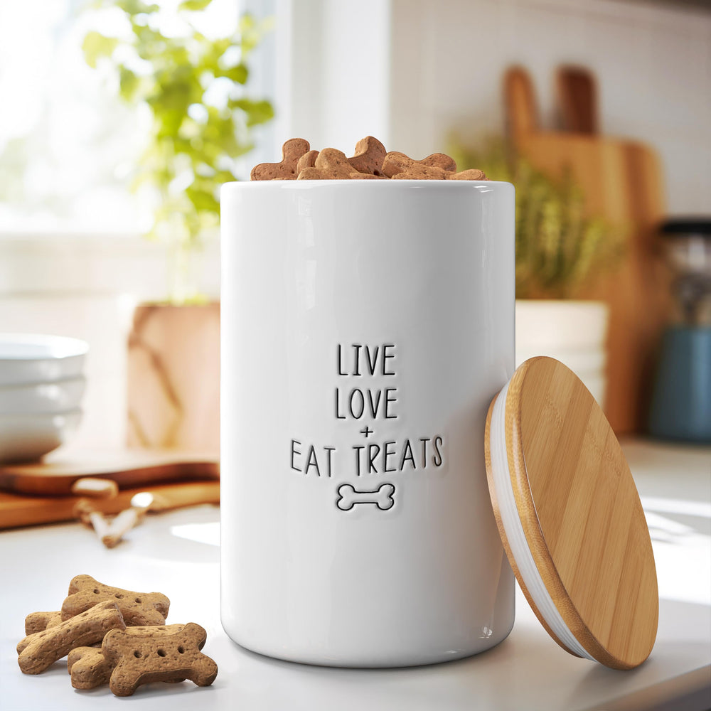 Barnyard Designs ceramic dog treat jar in white adds rustic charm while storing dry treats.