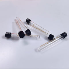 Base Wave aquarium test-tube used in a lab setting for testing.