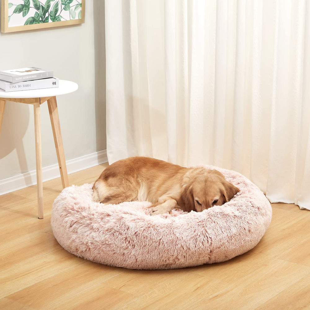 Bedfolks Calming Donut Dog Bed pink donut shape side view supports curling comfort