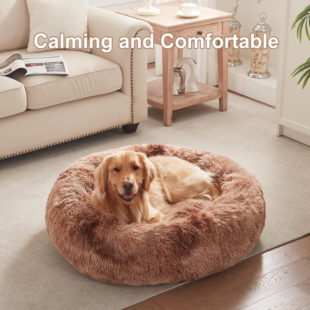 BedStill donut dog bed tie-dye brown side view demonstrates raised rim for anxiety relief.