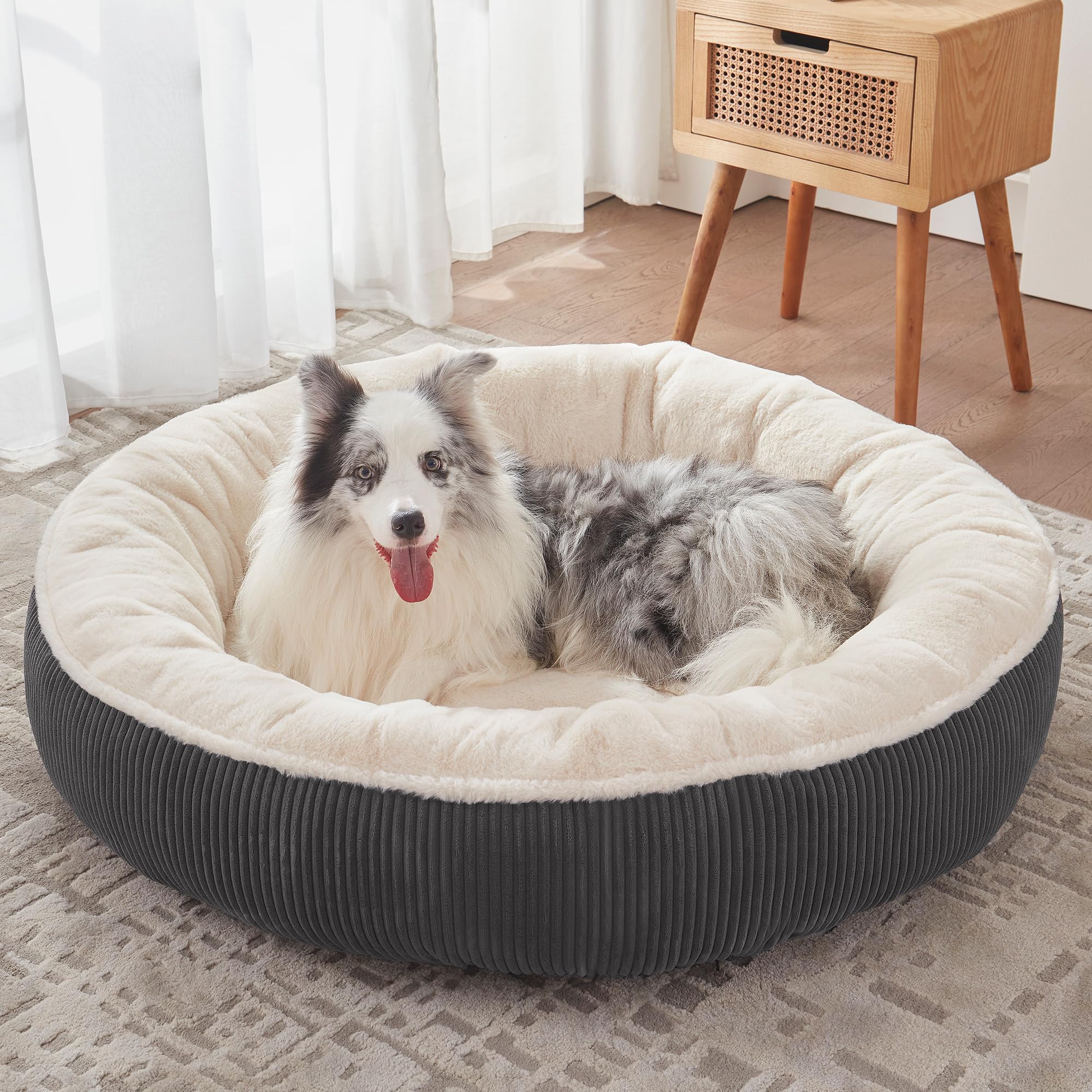 BedStill donut dog bed XL in dark grey showing the round shape for large dogs and supportive feel