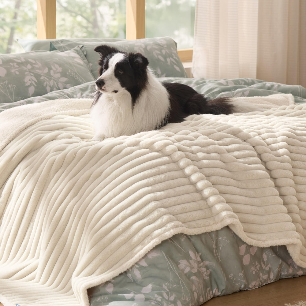 Bedsure cozy blanket ideal for large puppies or adult dogs on a comfy surface.