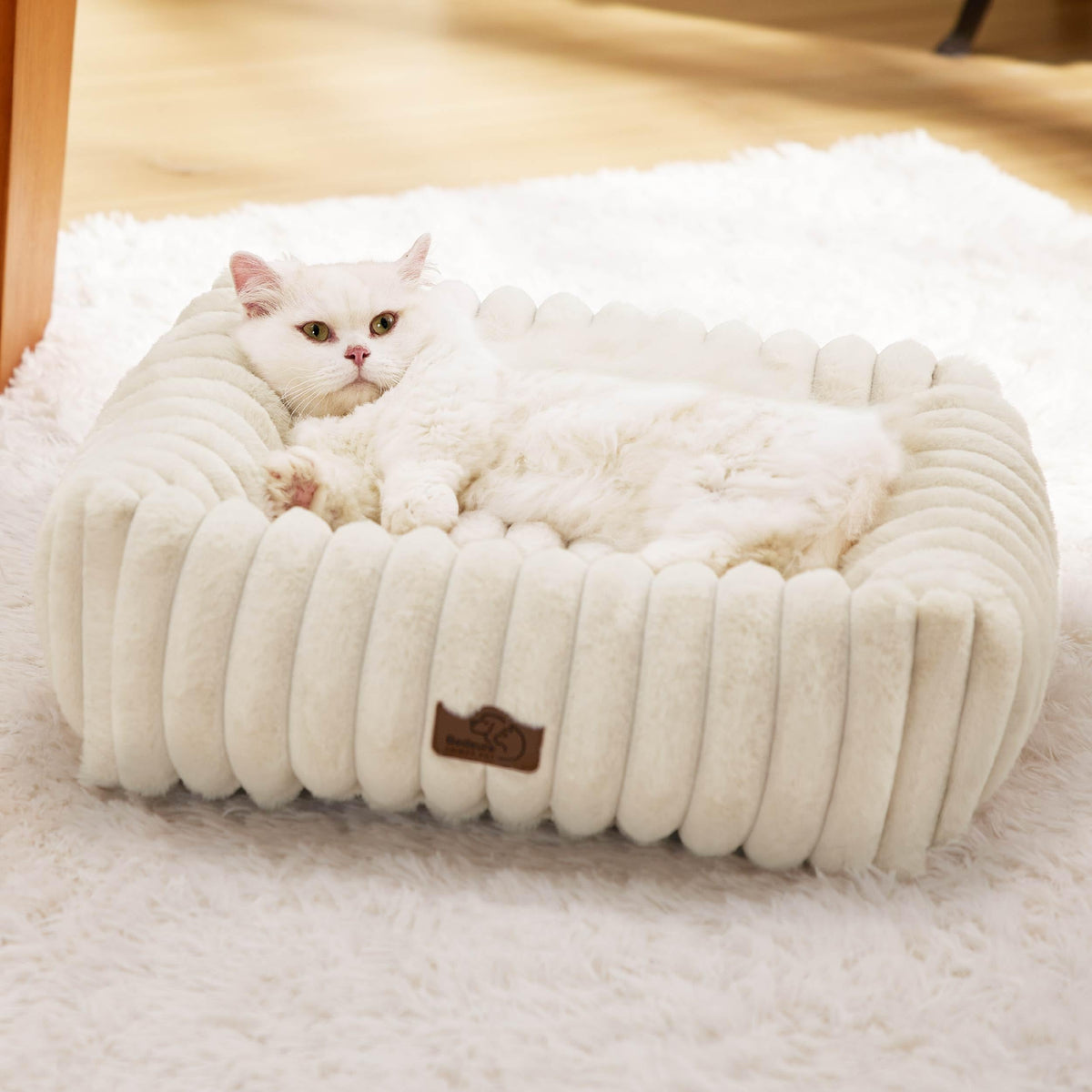 Bedsure cute dog bed cream — front view showing plush fur and cozy support.