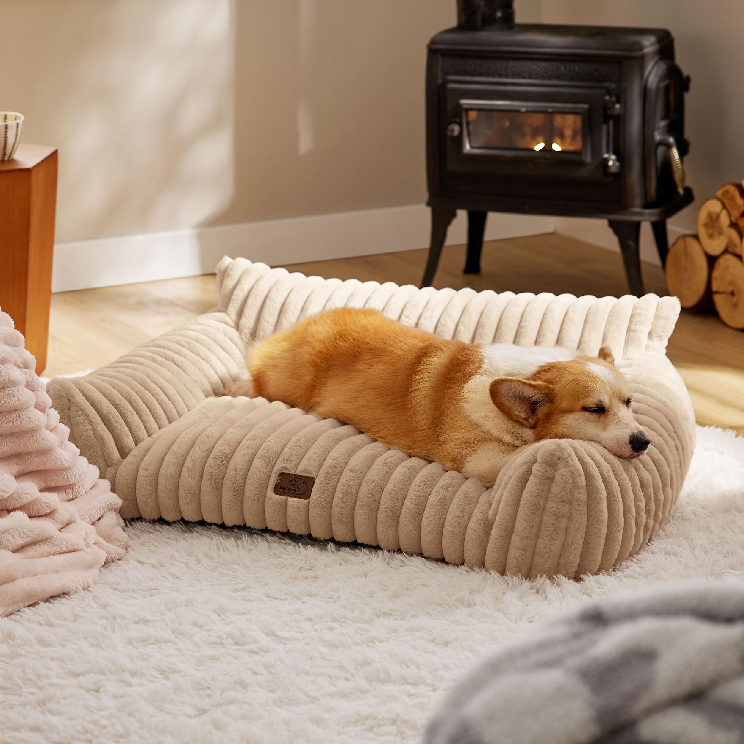 Bedsure dog couch shown in living room; fits decor while offering spacious rest.