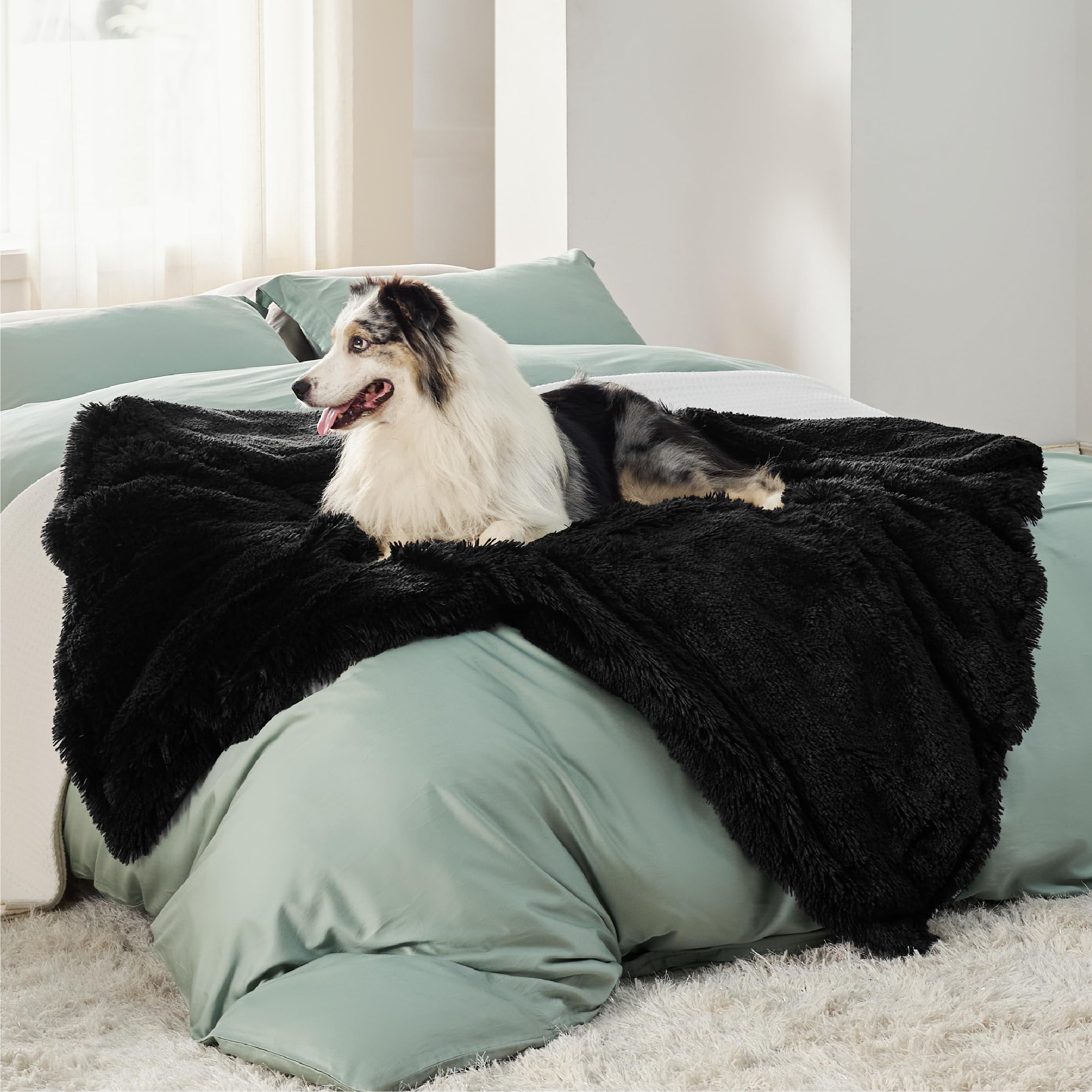 Bedsure waterproof dog blanket showing plush Sherpa side for furniture protection and comfort