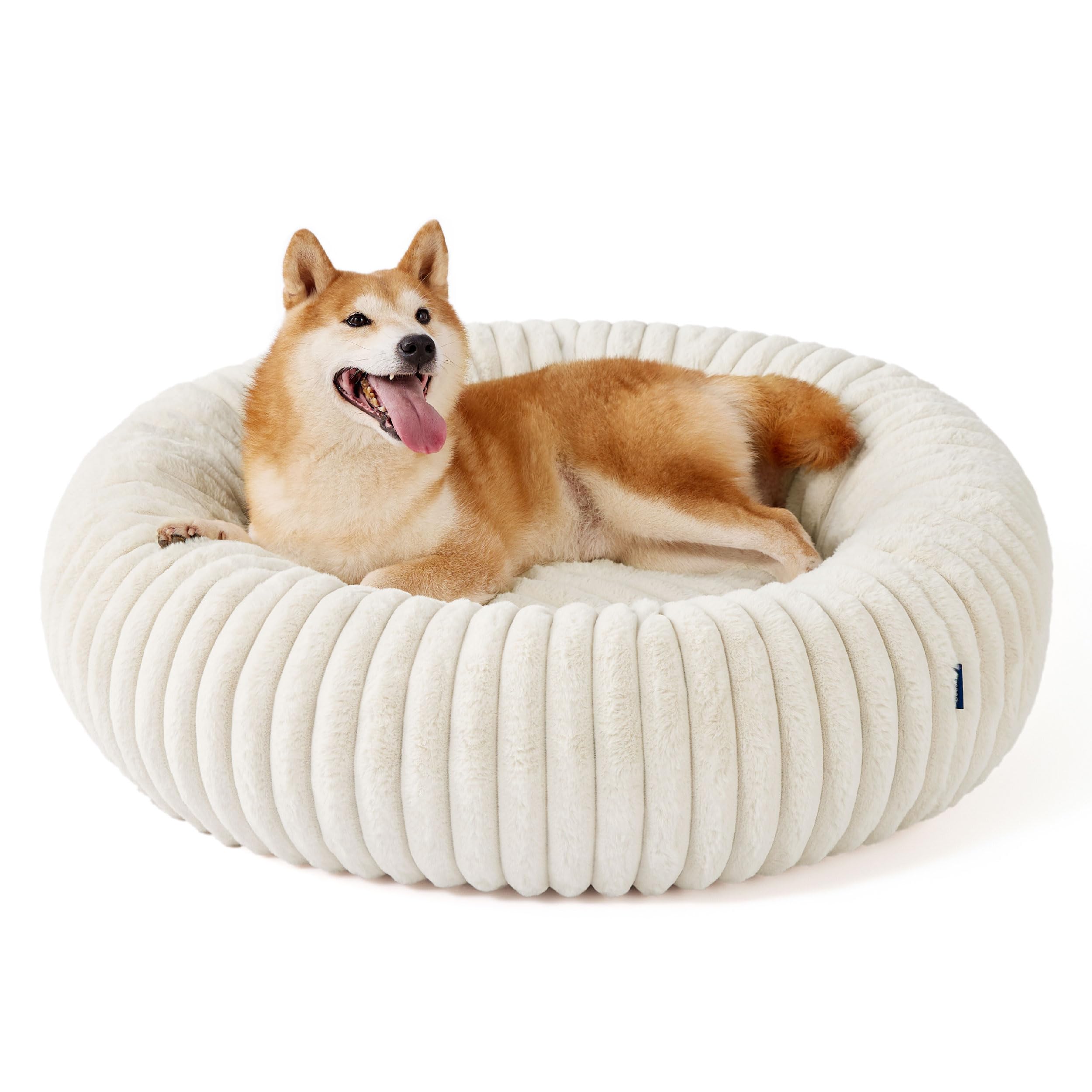 Bedsure Donut Bed cream-texture faux fur and corduroy fleece warmth.