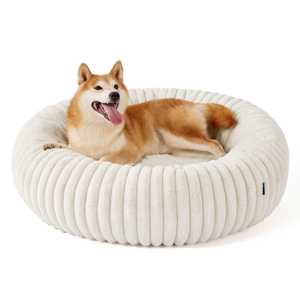 Bedsure Donut Bed cream-texture faux fur and corduroy fleece warmth.