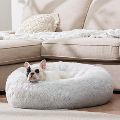 Bedsure donut bed raised edge supports head and neck for comforting naps.