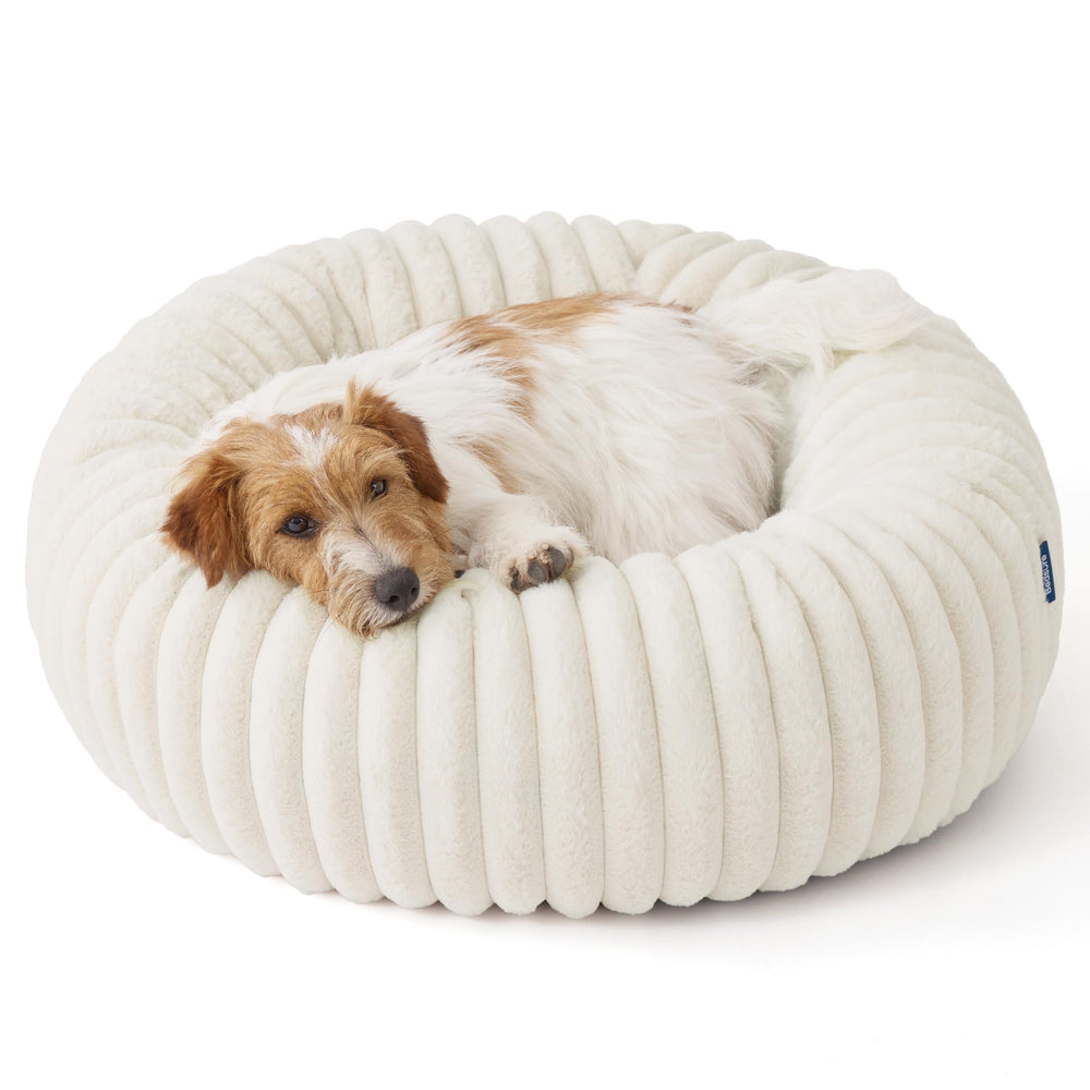 Bedsure Donut Small Dog Bed cream in a cozy room for restful lounging