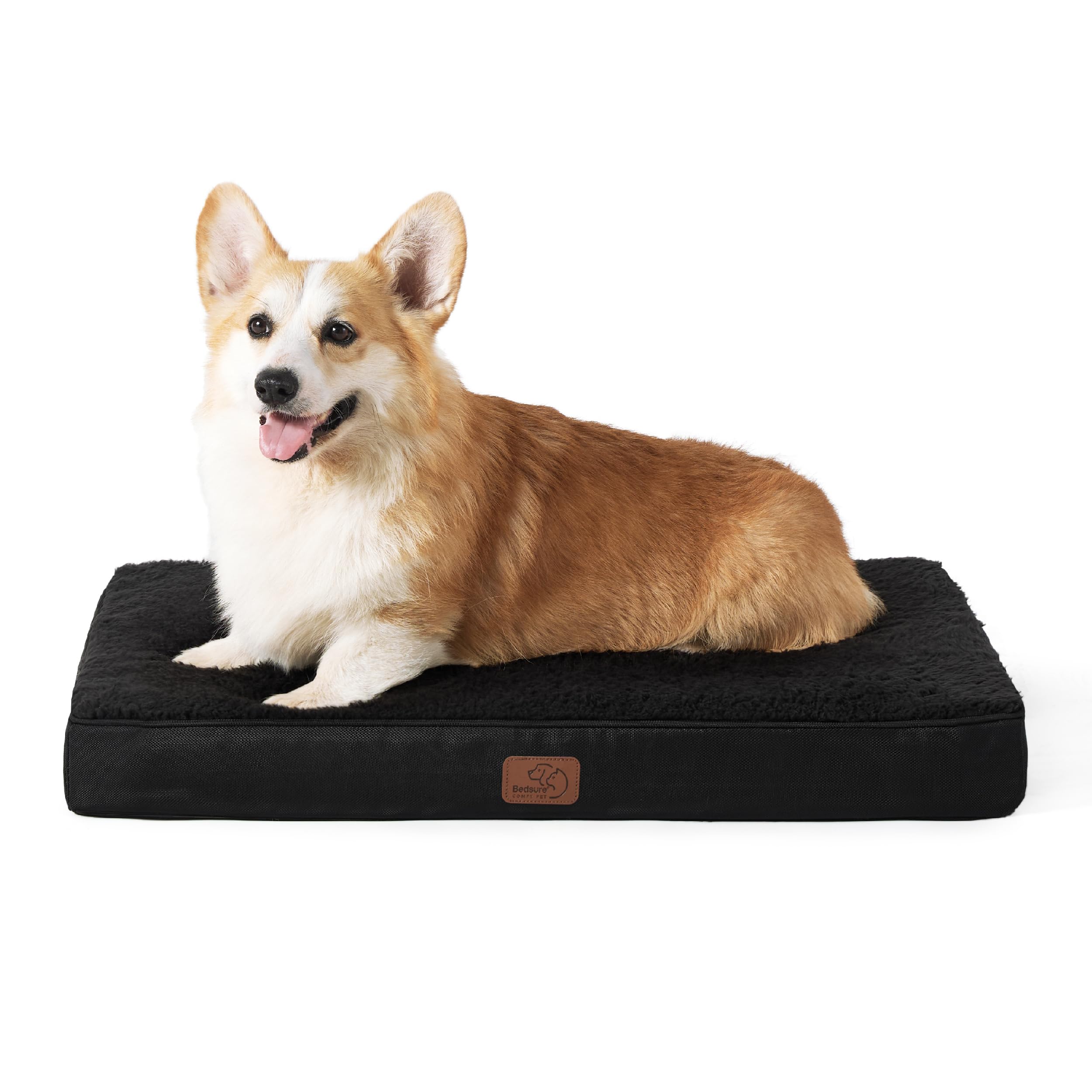 Bedsure large dog bed inside crate with plush surface for restful crate time.