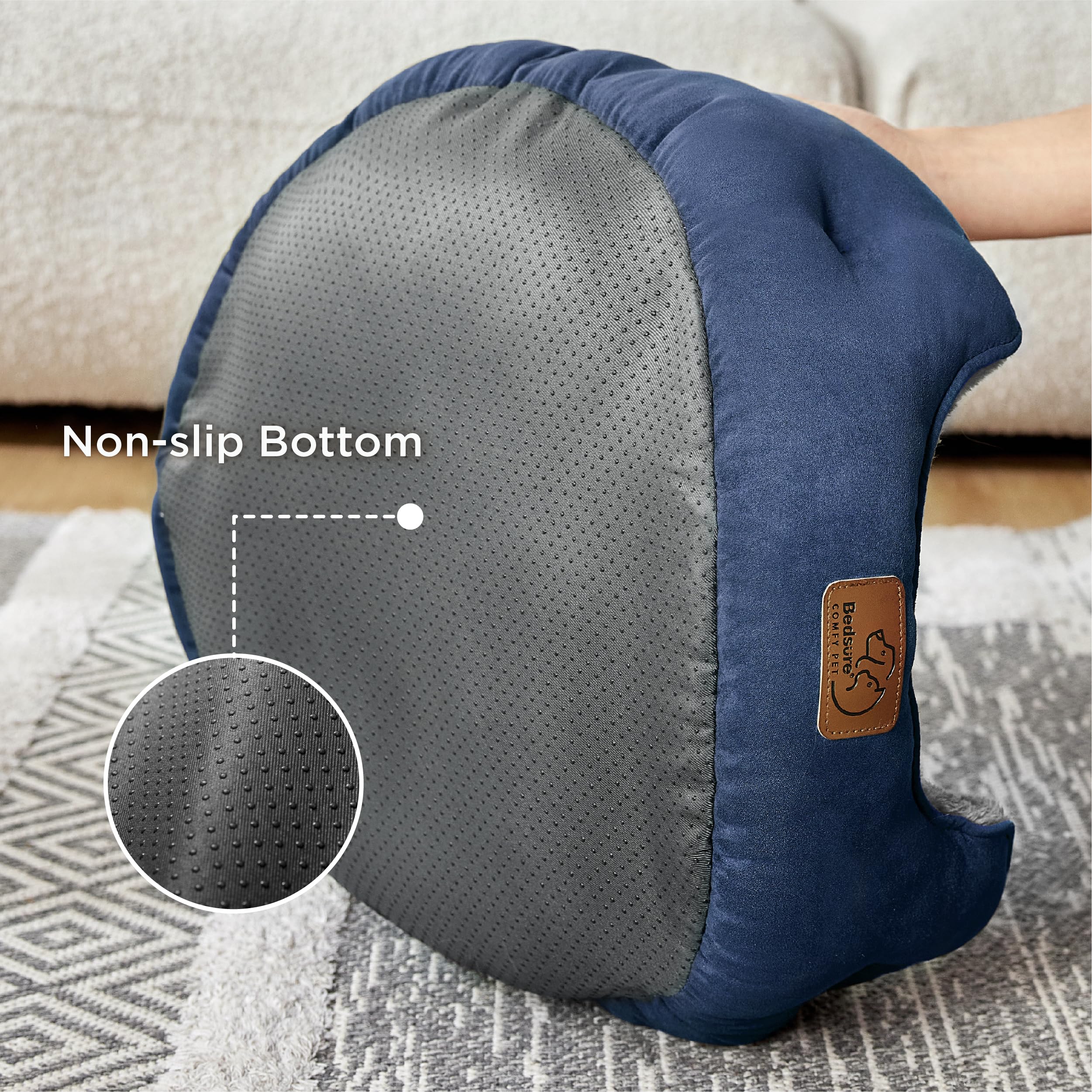 Bedsure round cat bed in navy with bolster for secure lounging.
