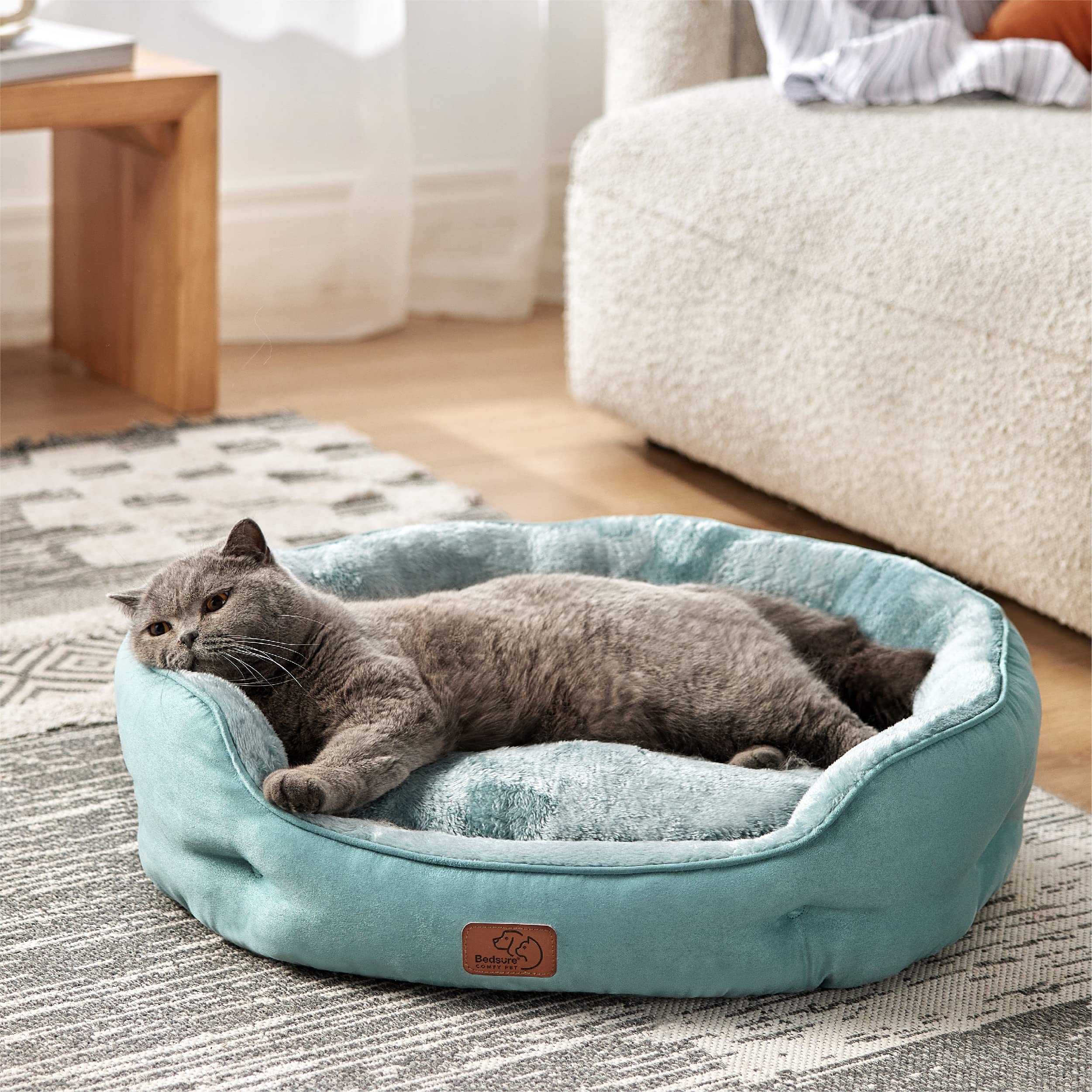 Bedsure round dog bed showing a cushioned bolster for head and neck support.