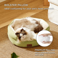 Bedsure round bed green in-use pet with plush interior invites relaxed lounging.