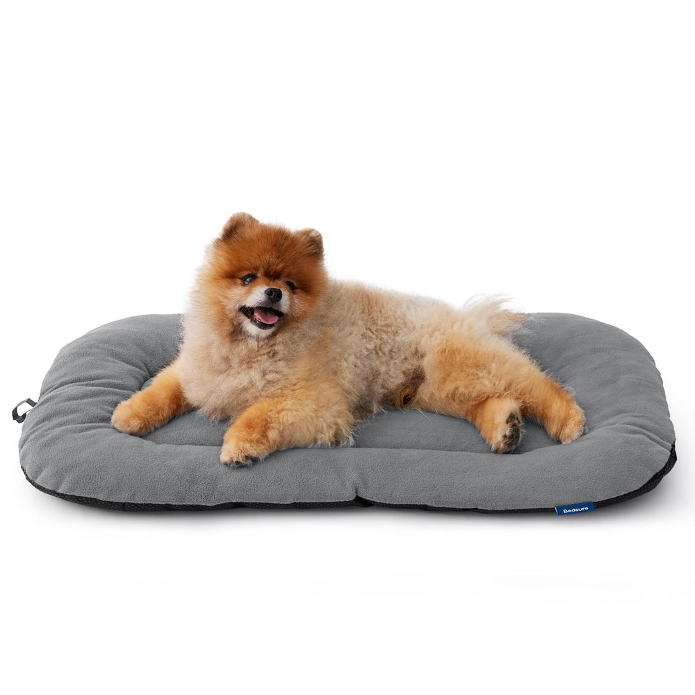 Bedsure flat-profile pad in crate supports slim, travel-friendly setup.