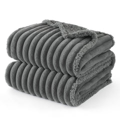 Bedsure waterproof dog blanket protects couch from spills and hair for large dogs.