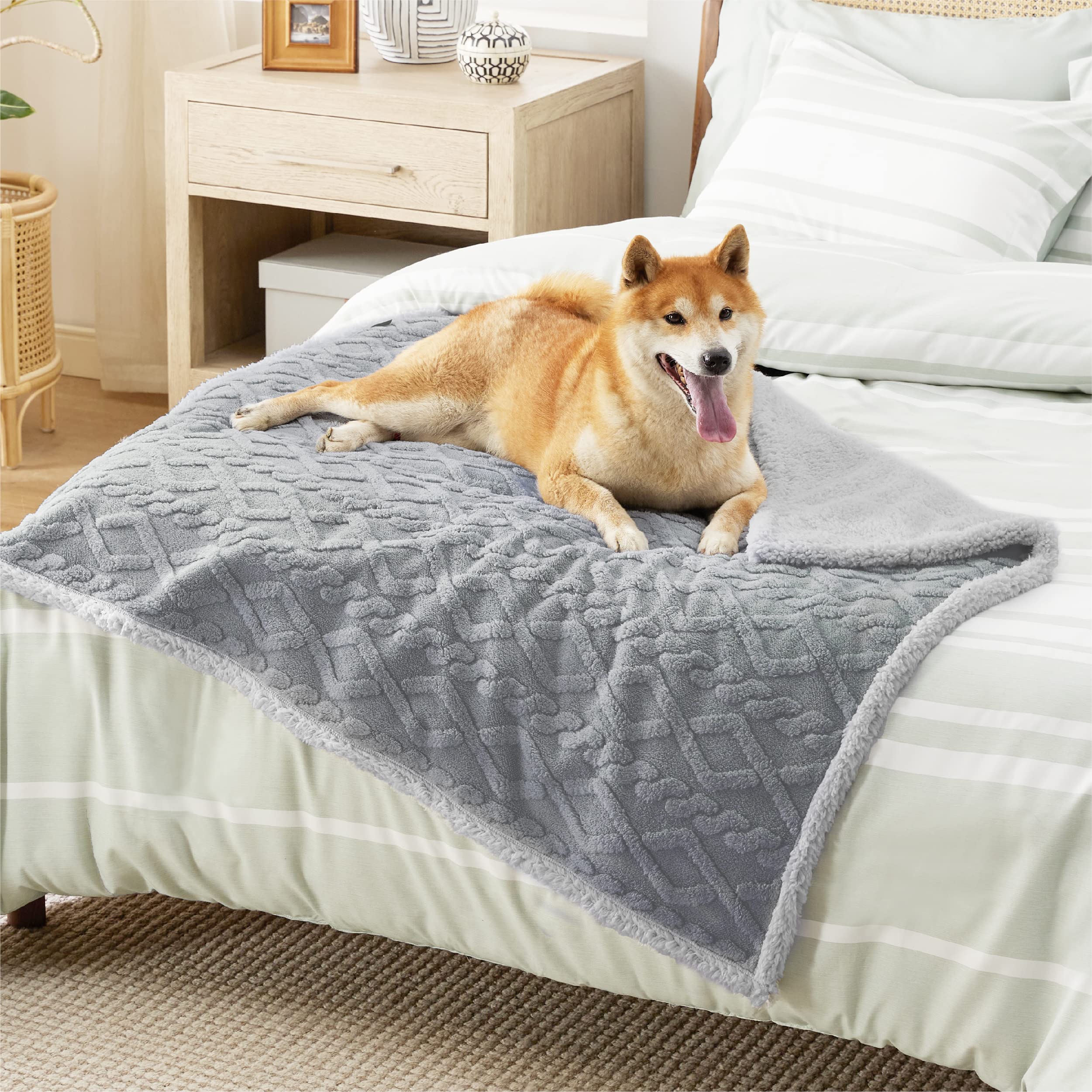 Bedsure portable-travel ready image shows lightweight blanket for trips with pets