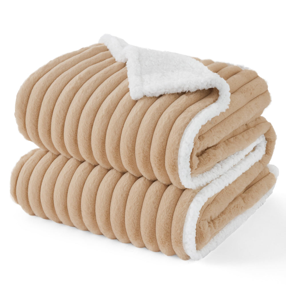 Bedsure waterproof dog-blanket on sofa protecting furniture, cozy and practical.