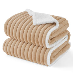 Bedsure waterproof dog-blanket on sofa protecting furniture, cozy and practical.