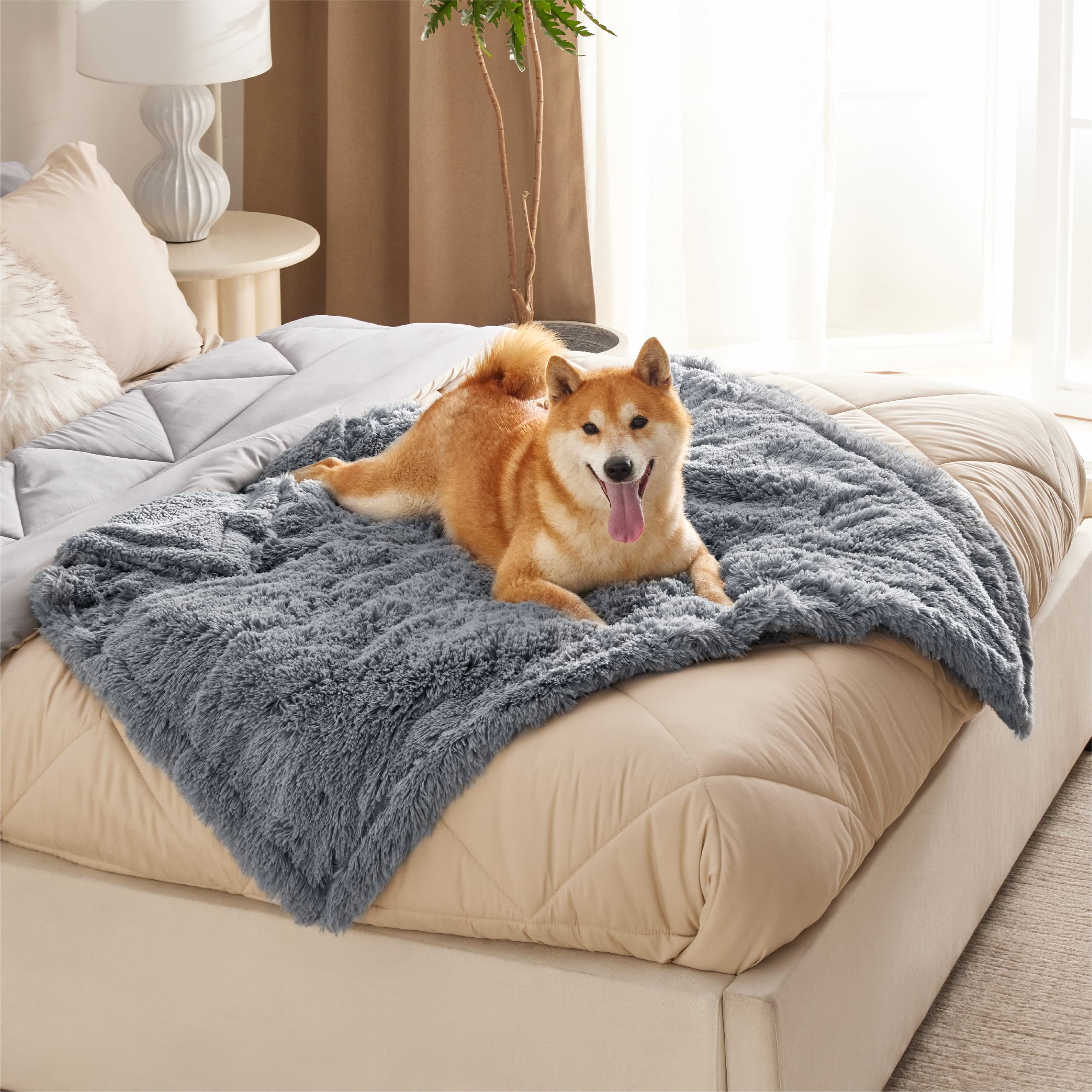 Bedsure waterproof pet blanket leakproof layer helps keep floors dry during play
