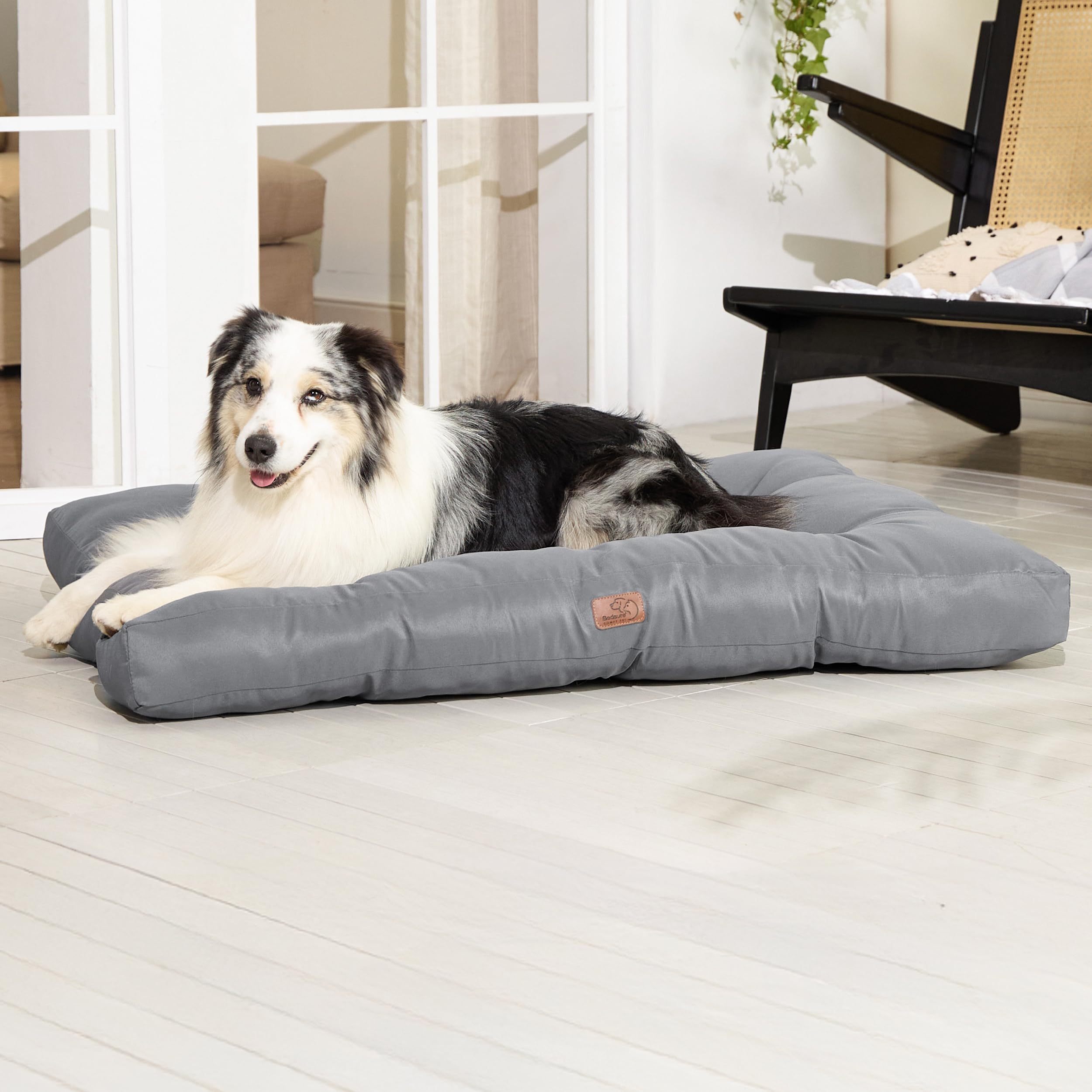 Bedsure XL dog bed shown in crate setup for travel use