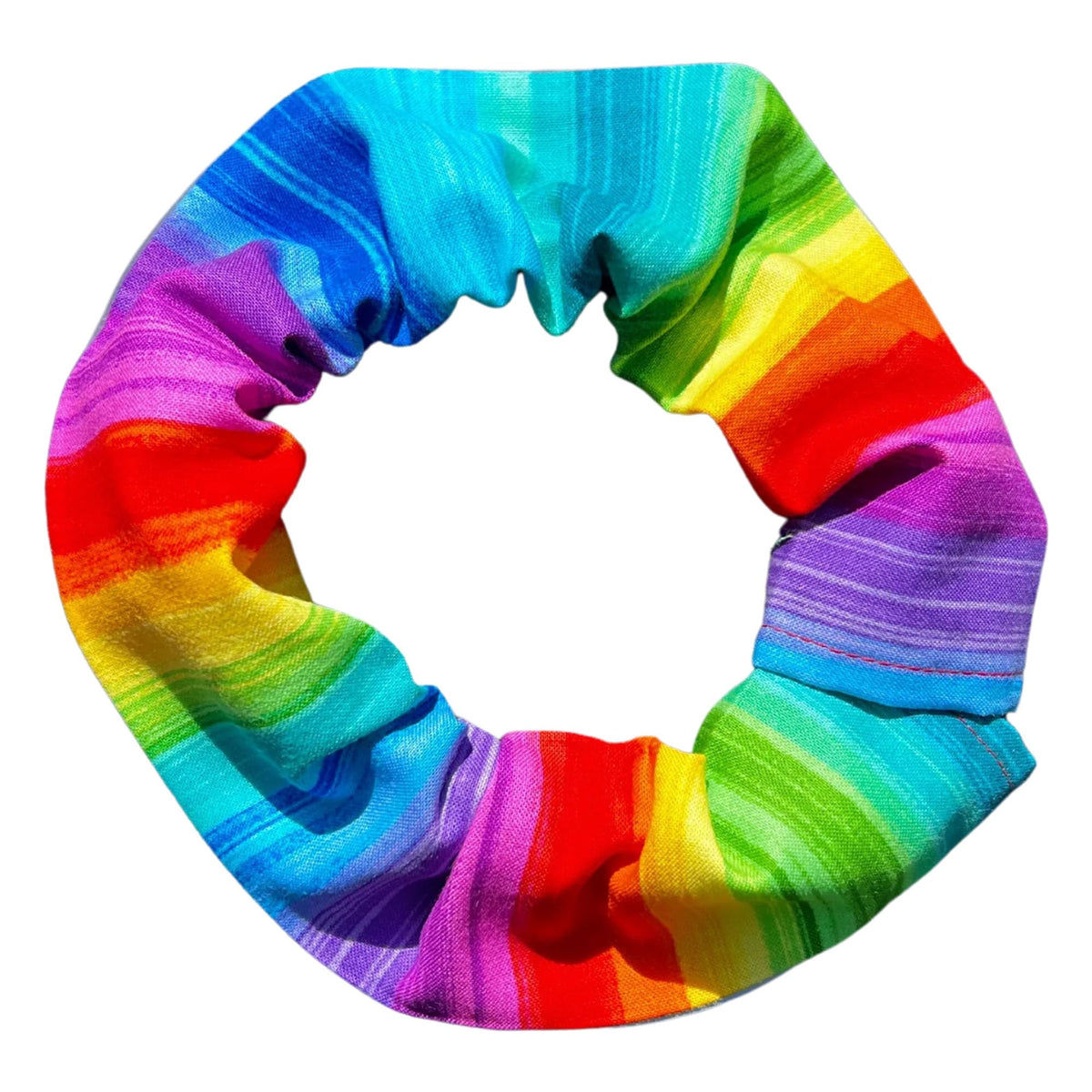 Birdsbesafe Rainbow Sally cat collar cover closeup shows vibrant rainbow pattern for bird visibility.