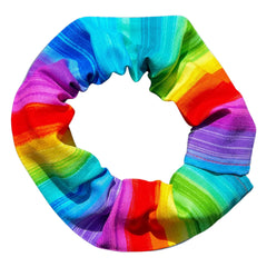 Birdsbesafe Rainbow Sally cat collar cover closeup shows vibrant rainbow pattern for bird visibility.