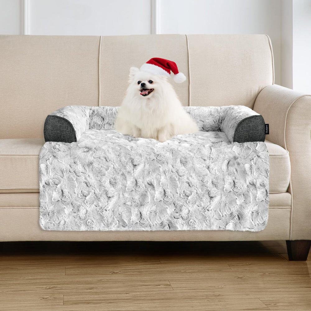 blunique Calming Small Dog Bed on couch in grey for cozy resting spots