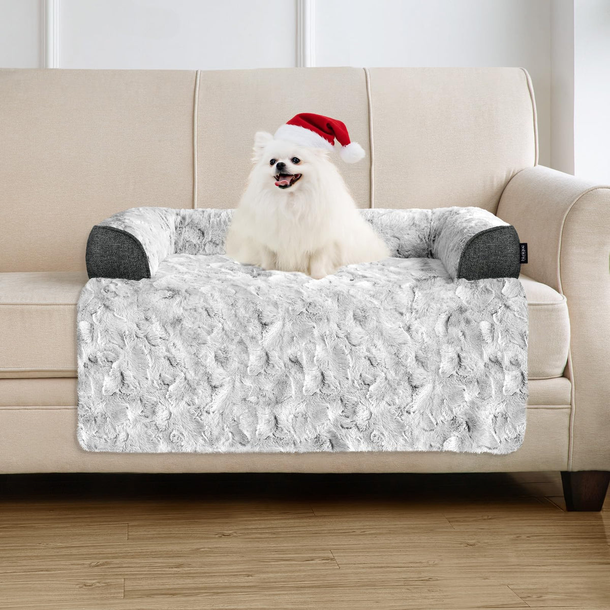 blunique Calming Small Dog Bed on couch in grey for cozy resting spots