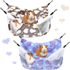 Boao hammock in purple heart-pattern fabric provides cozy rest for small pets.