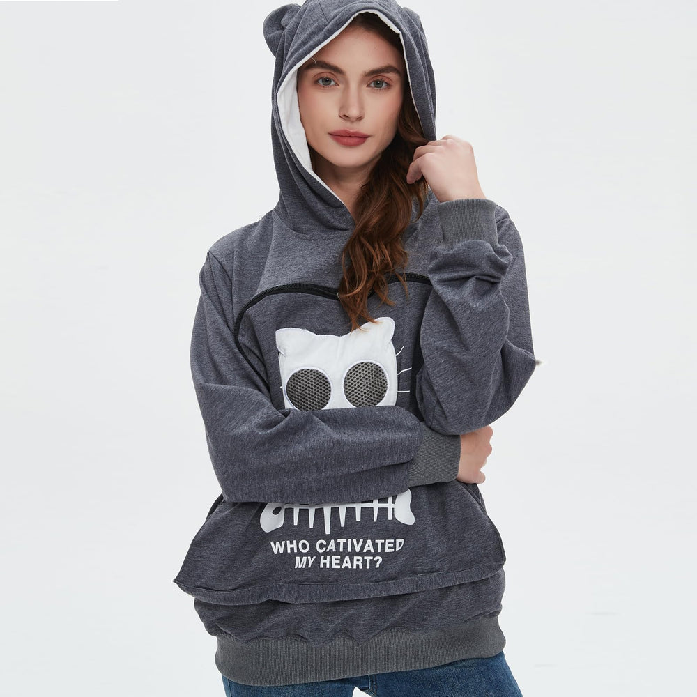 Bombaxceiba Pet Pouch Hoodie worn by pet demonstrates comfortable indoor lounging.