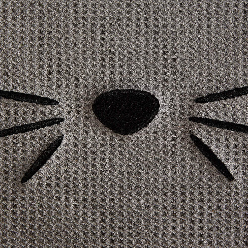Bone Dry microfiber pet mat absorbs spills and protects floors during meals.