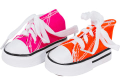 Bonka Bird Toys 2 Mini Sneakers colorful cotton chew in use for birds with chewy textures.