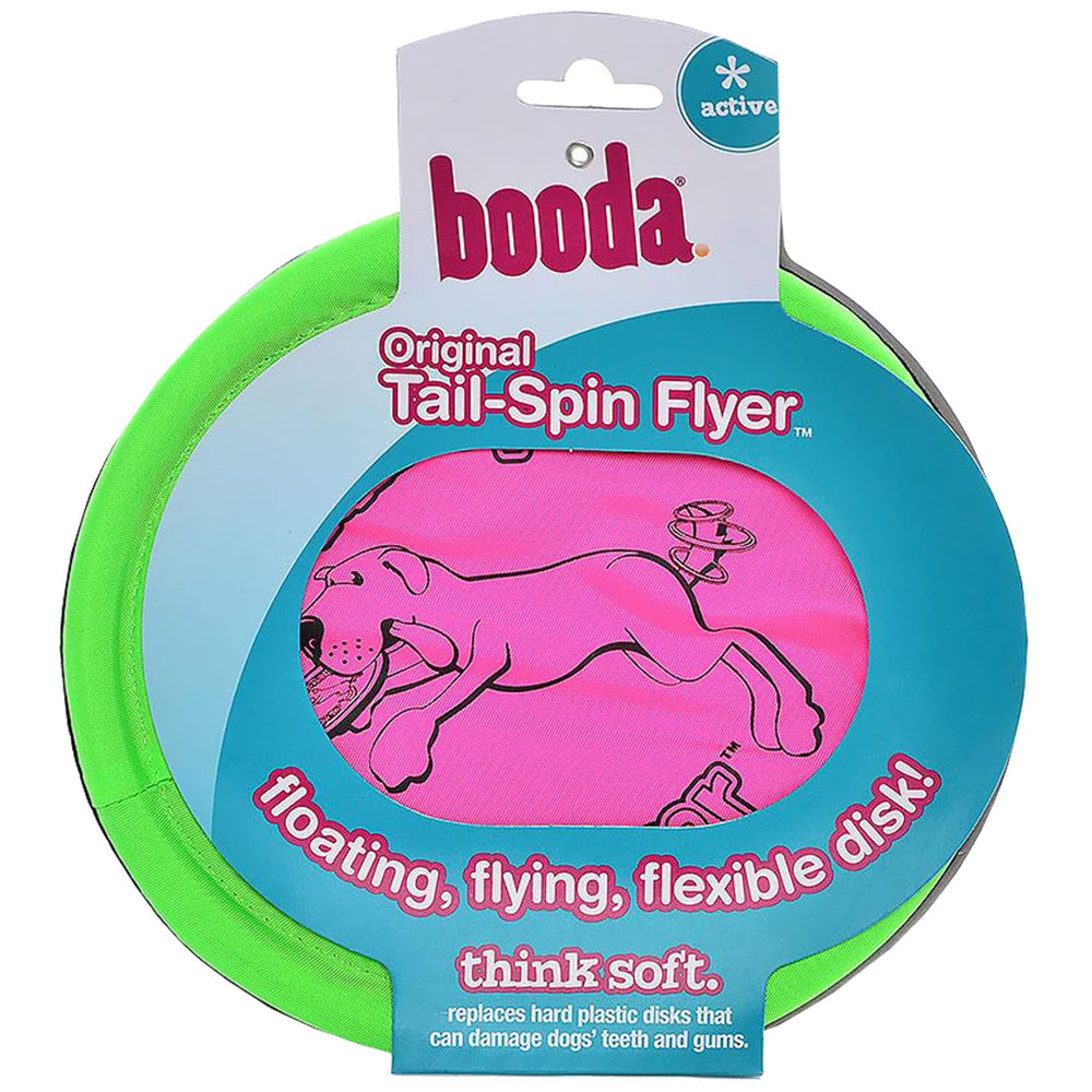 Dog retrieves Booda Tail-Spin Flyer during mid-fetch session