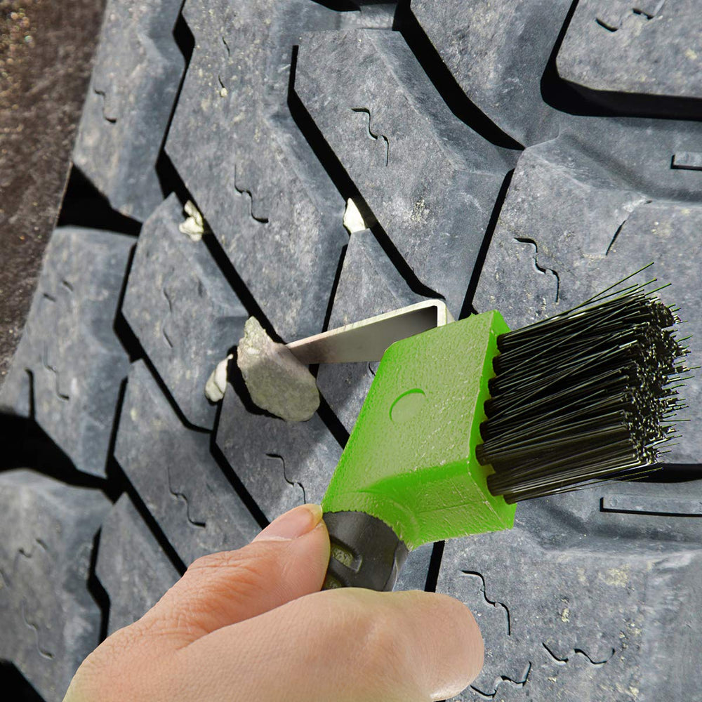 BOTH WINNERS multi-use hoof pick in a stable cleaning scenario for boots and hooves