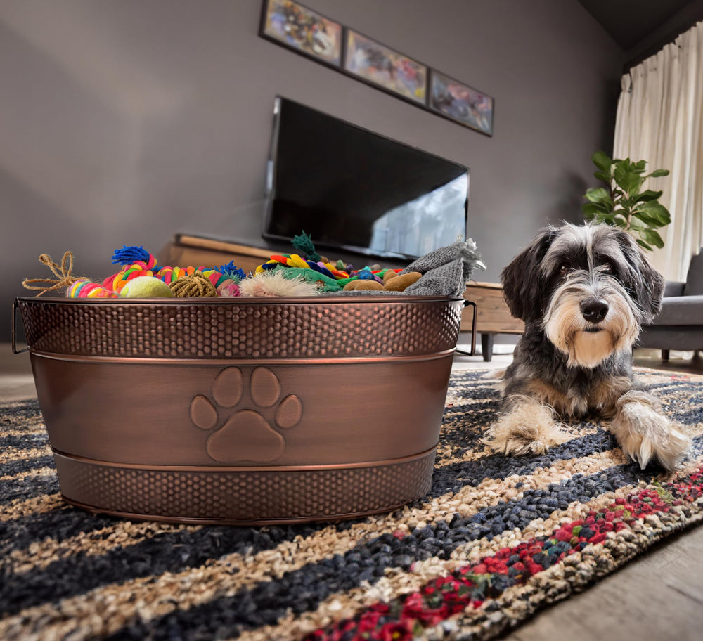 BREKX dog toy bin doubles as a blanket and leash organizer in living spaces.