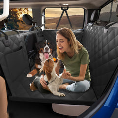 Btefd XL Truck Back Seat Extender setup shows expanded space for dogs on trips.